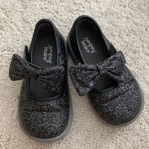 Black glittery toddler shoes with bow